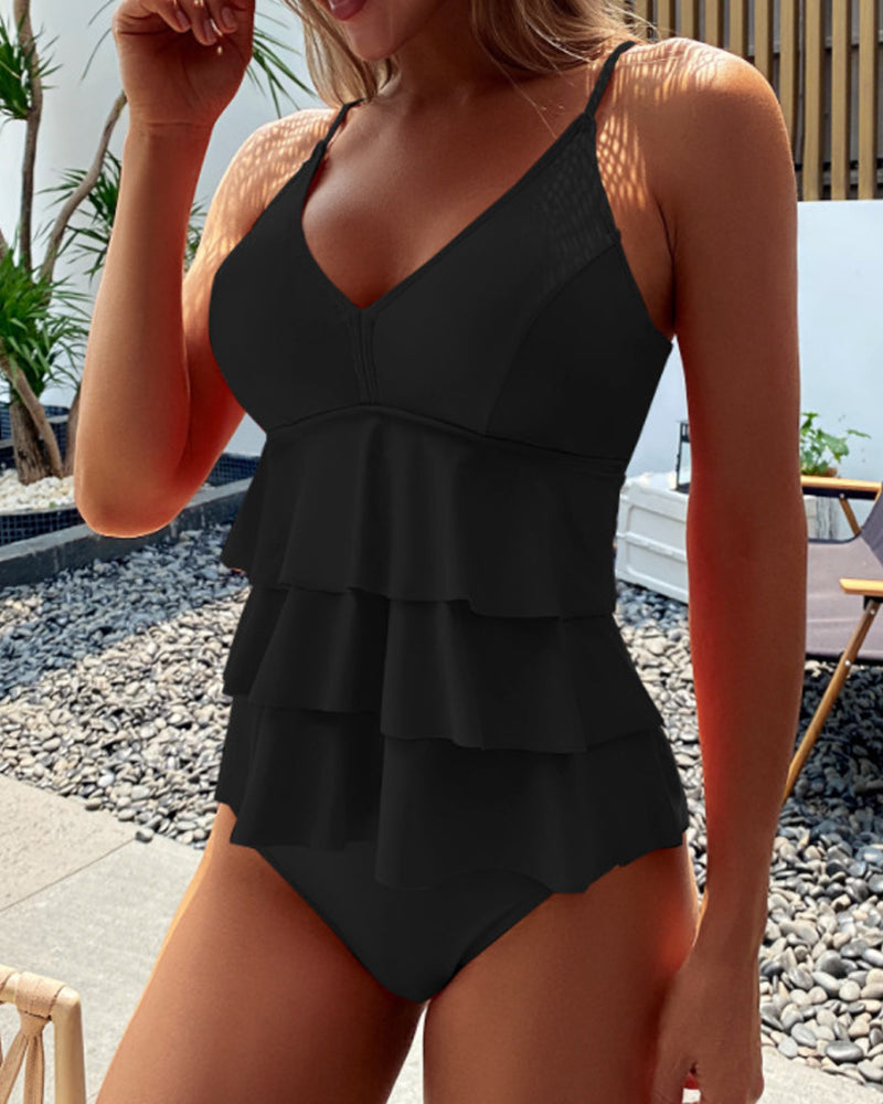 Lia – Elegant Ruffled Solid Swimsuit