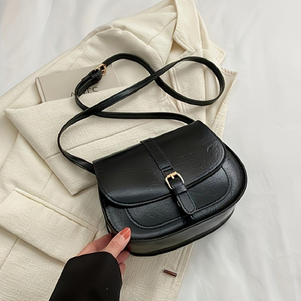 Evelyn | Compact and stylish — Leather Saddle Bag
